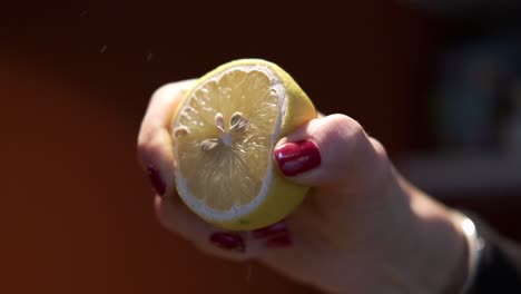 pressing out a lemon, for cooking