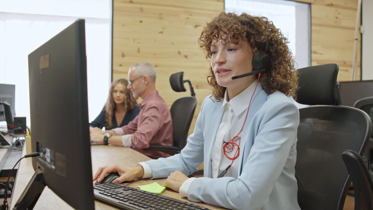 Customer service representatives in an office setting