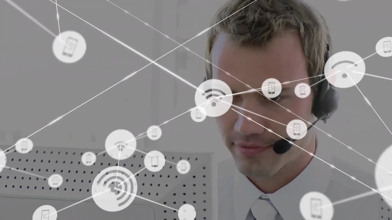Animation of network of connections and icons over businessman wearing headset