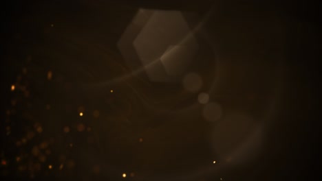 partículas de oro y efecto de luz