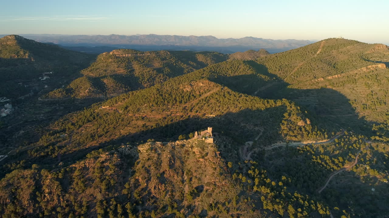 Aerial View Of Mountainous Landscape With Ruined Medieval Castle. Serra, Valencia, Spain