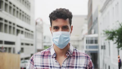 Front-view-of-Caucasian-man-wearing-a-coronavirus-Covid19-mask