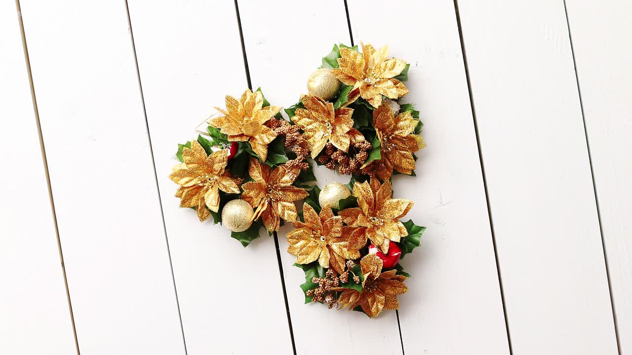 Christmas Wreath on White Wooden Background
