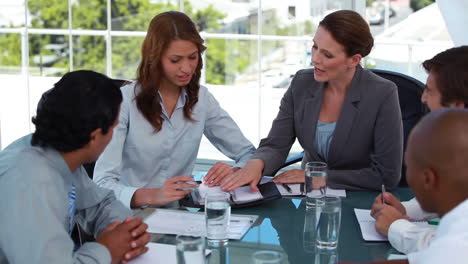 business people looking at a diary