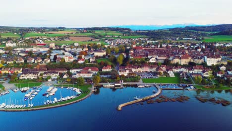 murten switzerland from above from a drone flying over the lake.