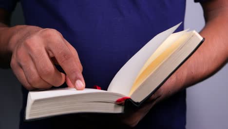 person reading an open book