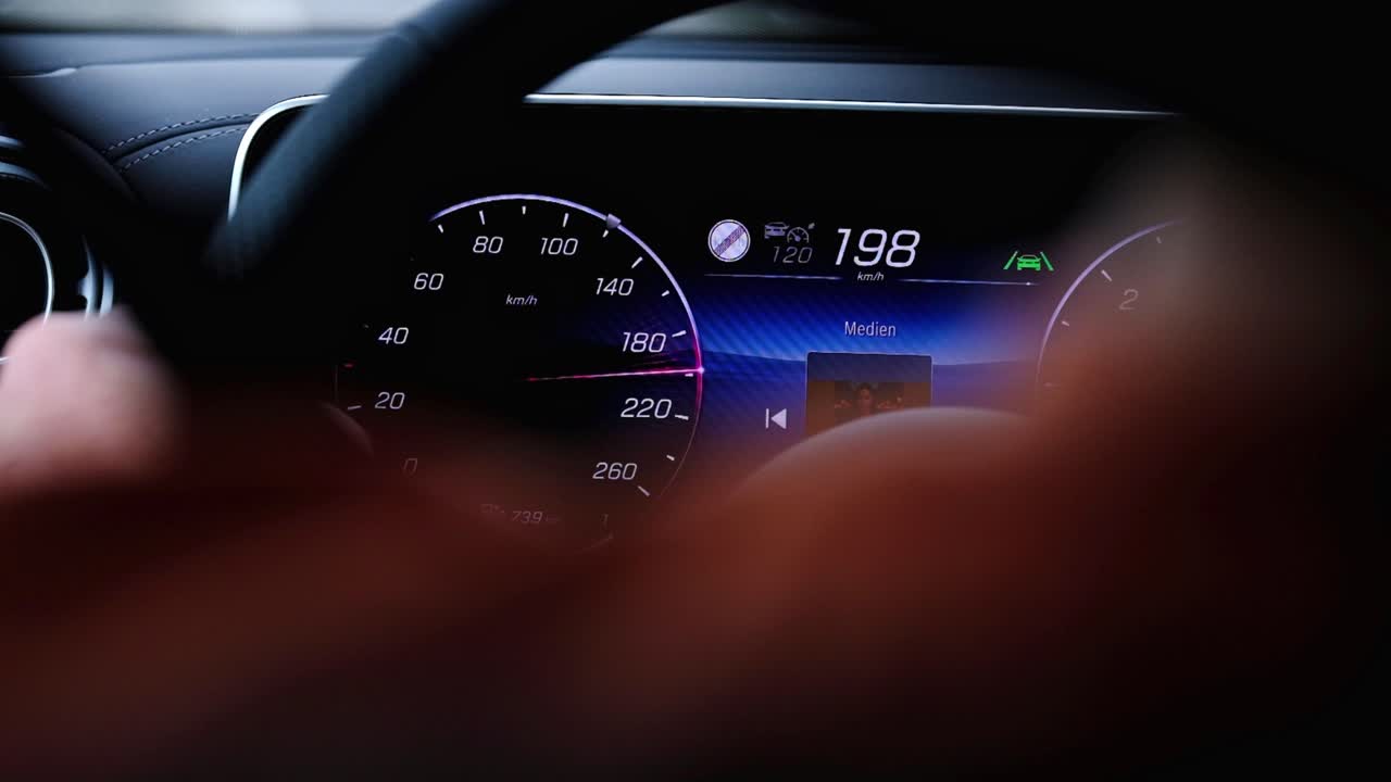 A man drives his car very fast on the Autobahn in Germany