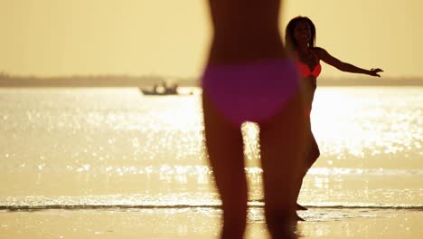 young african american asian chinese girls on beach
