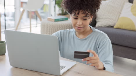 woman online shopping with a laptop