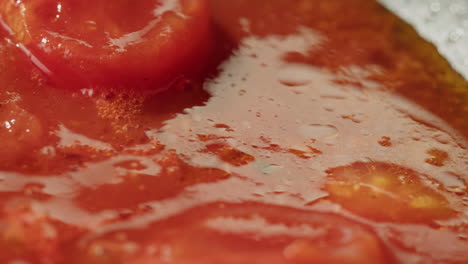 closeup of tomato sauce cooking