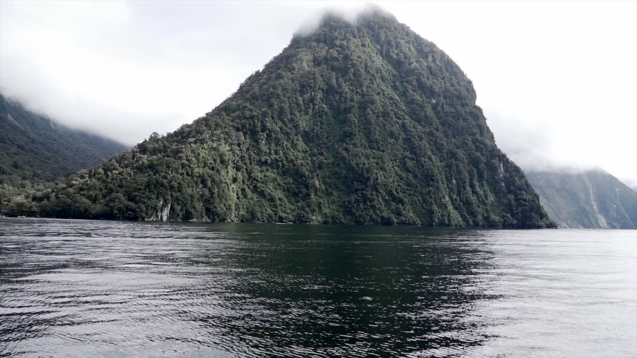 Scenic Views of Milford Sound, New Zealand: Water, Mountains, and Nature