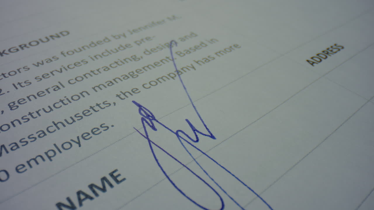 Person holding nibbed fountain pen. Closeup worker signing contract