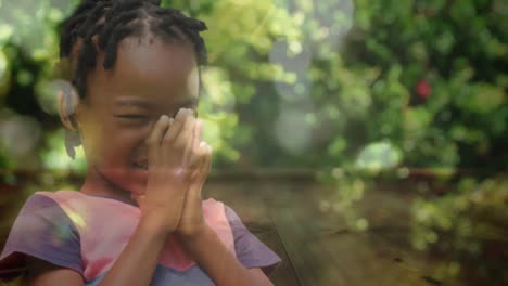 Little-girl-praying-in-the-woods