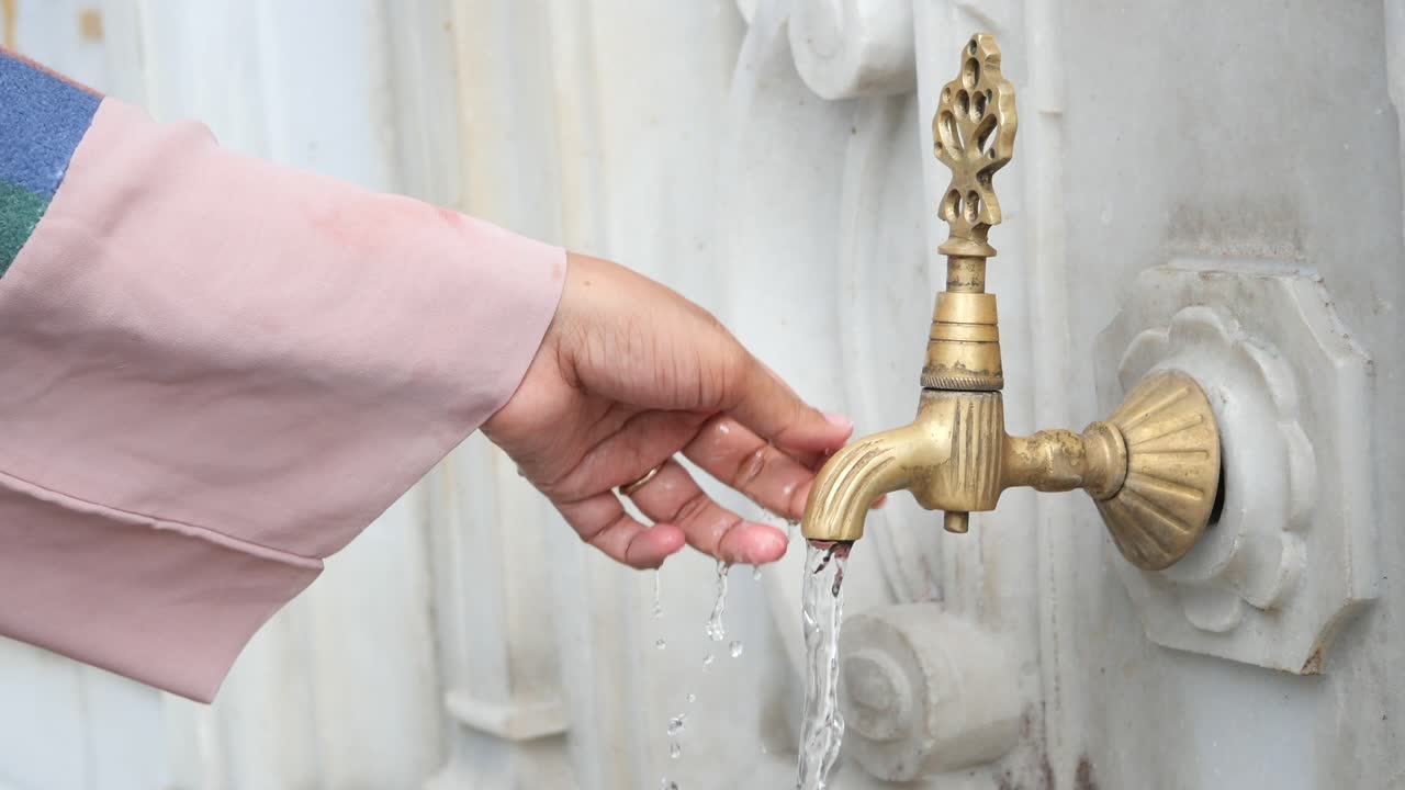 Washing Hands at a Traditional Turkish Water Fountain