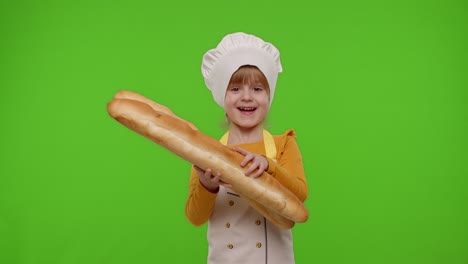 Child-girl-kid-cook-chef-baker-sniffing-two-fresh-baguettes,-smiling,-waving-head-in-agreement