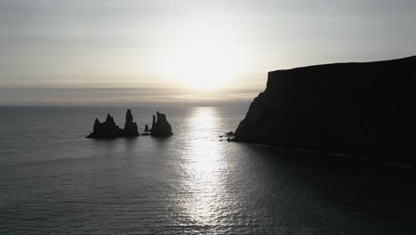 Reynisdrangar-Sea-Stacks,-in-aerial-view-next-to-Vik-,-Iceland