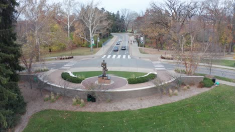 the spartan statue at michigan state university with drone video moving forward