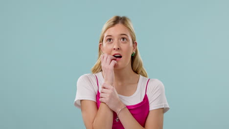 Thinking,-anxiety-and-woman-biting-nails-in-studio