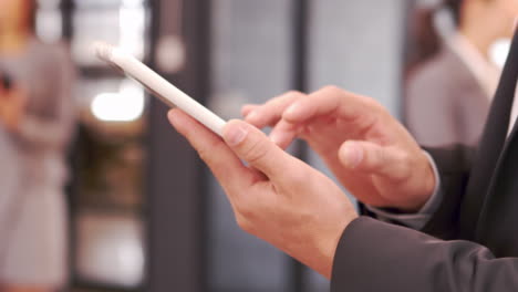 cropped video of businessman typing on smartphone