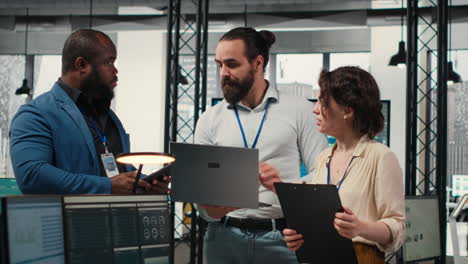 vertical video diverse group of employees collaborate on project planning and analysis