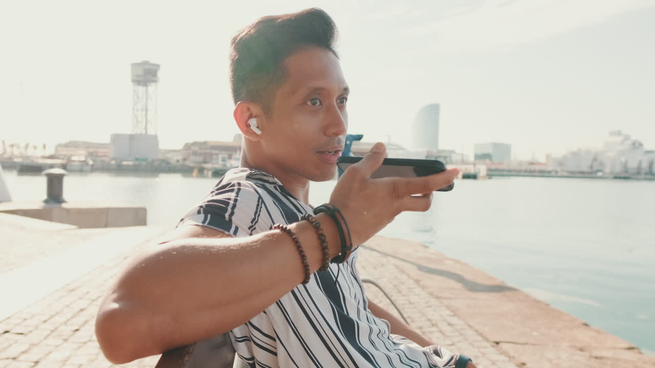 Man using phone on beach