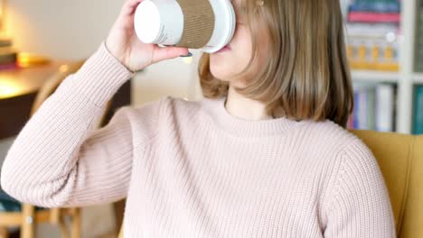 woman reading a novel while having coffee