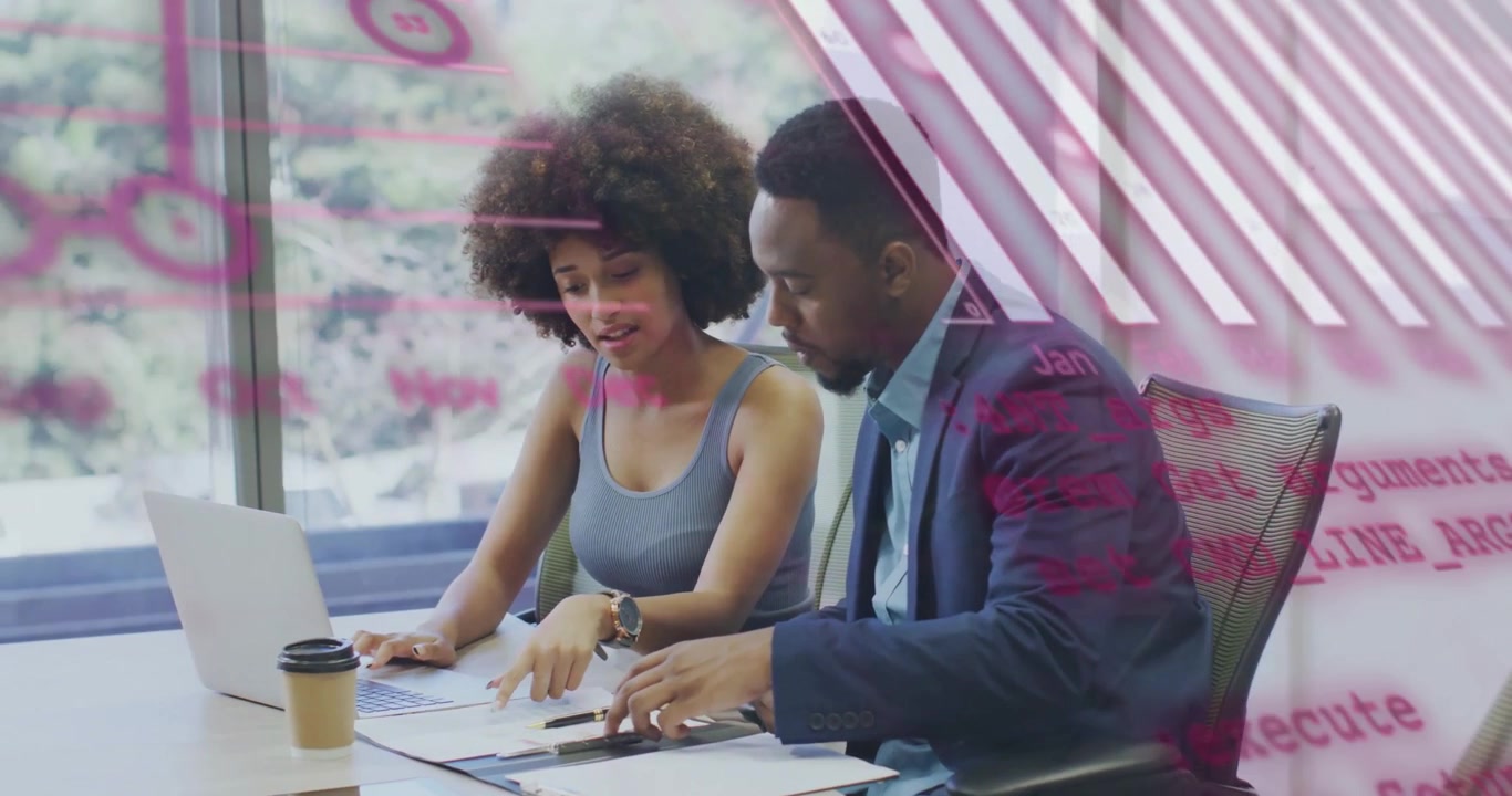 woman pointing to chart initiating business analysis while man writing notes and viewing visuals