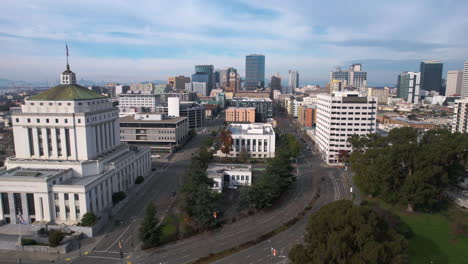 oakland ca usa, drone shot of alameda county superior courthouse and downtown buildings