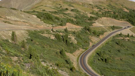 cars driving in the rocky mountains of colorado