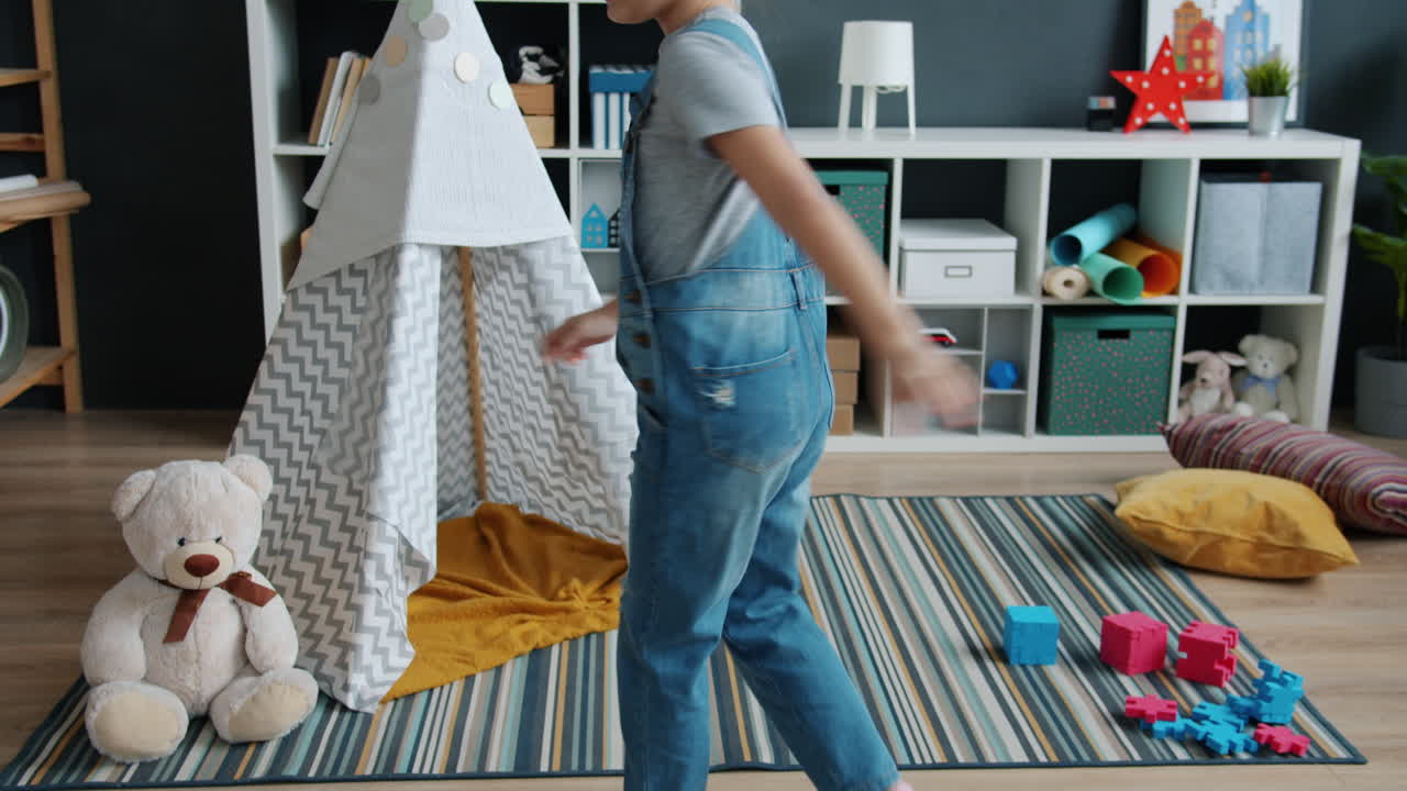 Child Playing in a Playroom