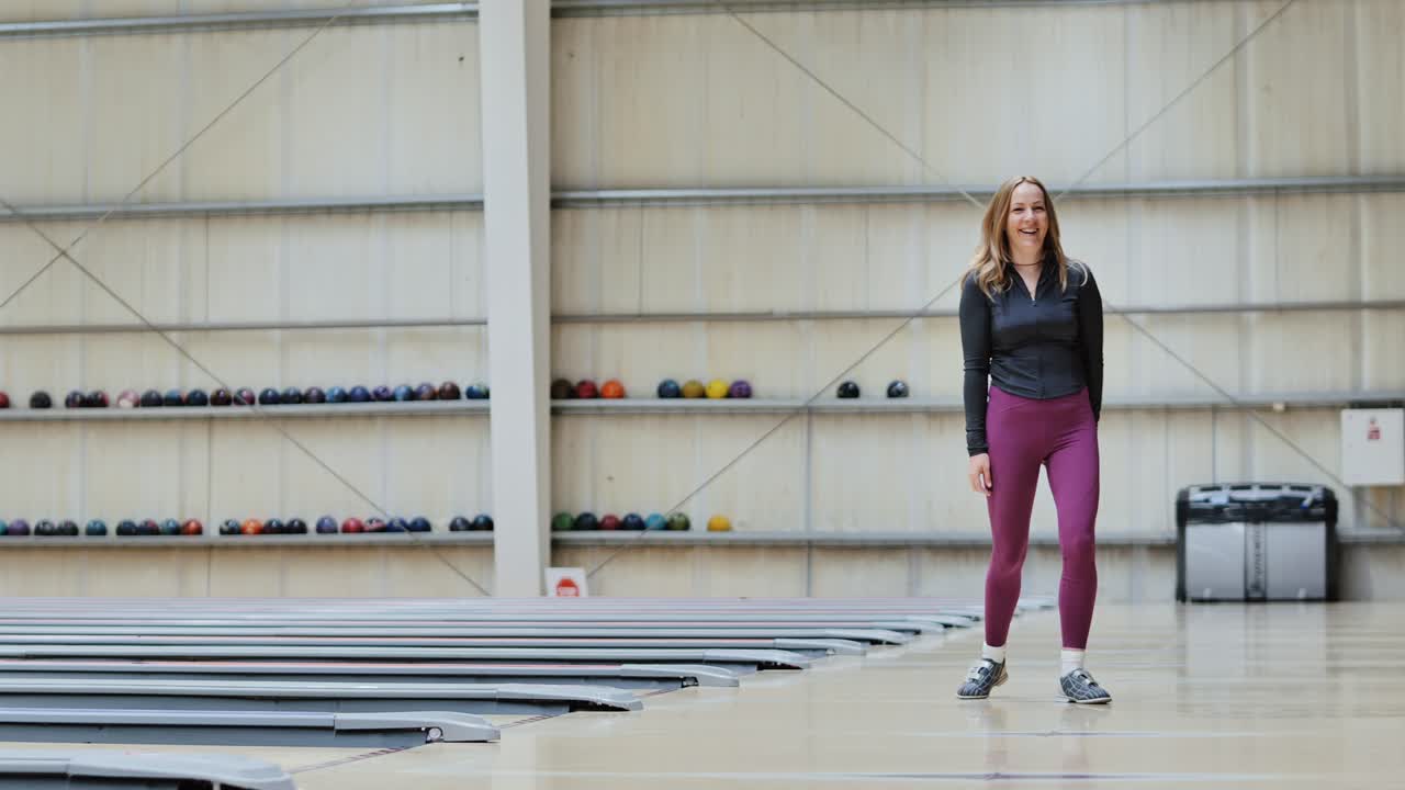 Slow mo imitation of bowling throw by woman learning proper athletic technique
