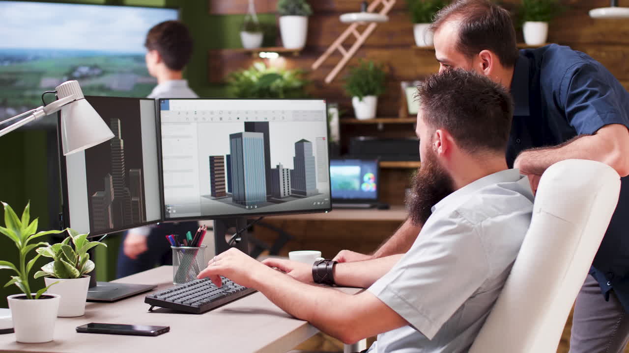 Architects working on 3D rendering of building design