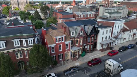 victorian-style row houses on a city street