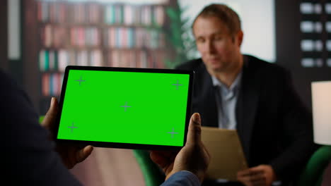 diverse secret agents examine clues at cia secret base with a green screen