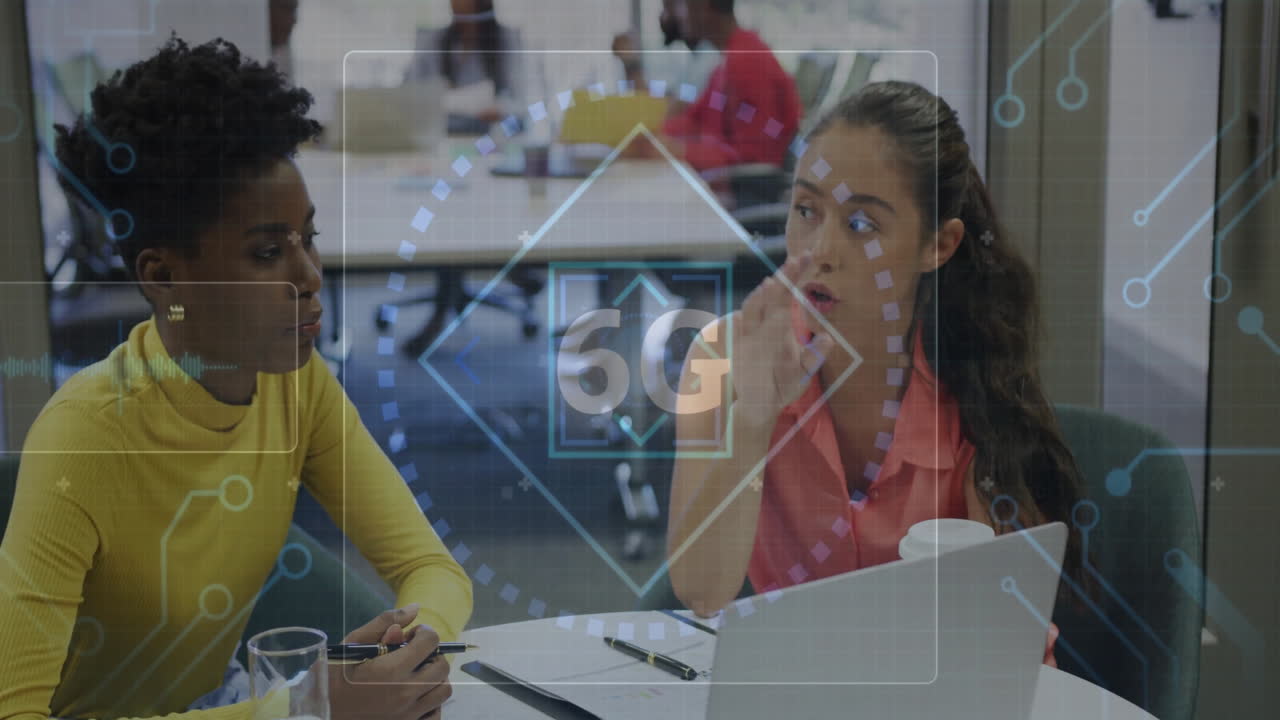 5G technology animation over diverse colleagues discussing at office table