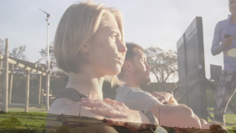 relaxing outdoors, two people with wind turbines and landscape in background