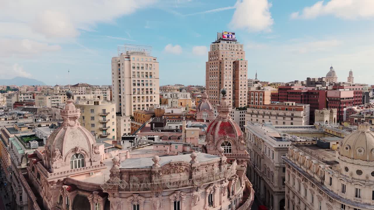 Historic architecture and modern skyline in genoa on a bright day with clear skies, aerial view