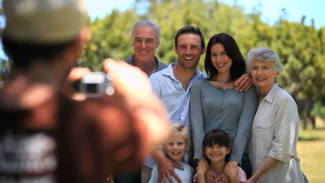 familys picture taken by a passerby