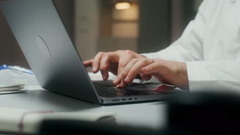 doctor working on a laptop