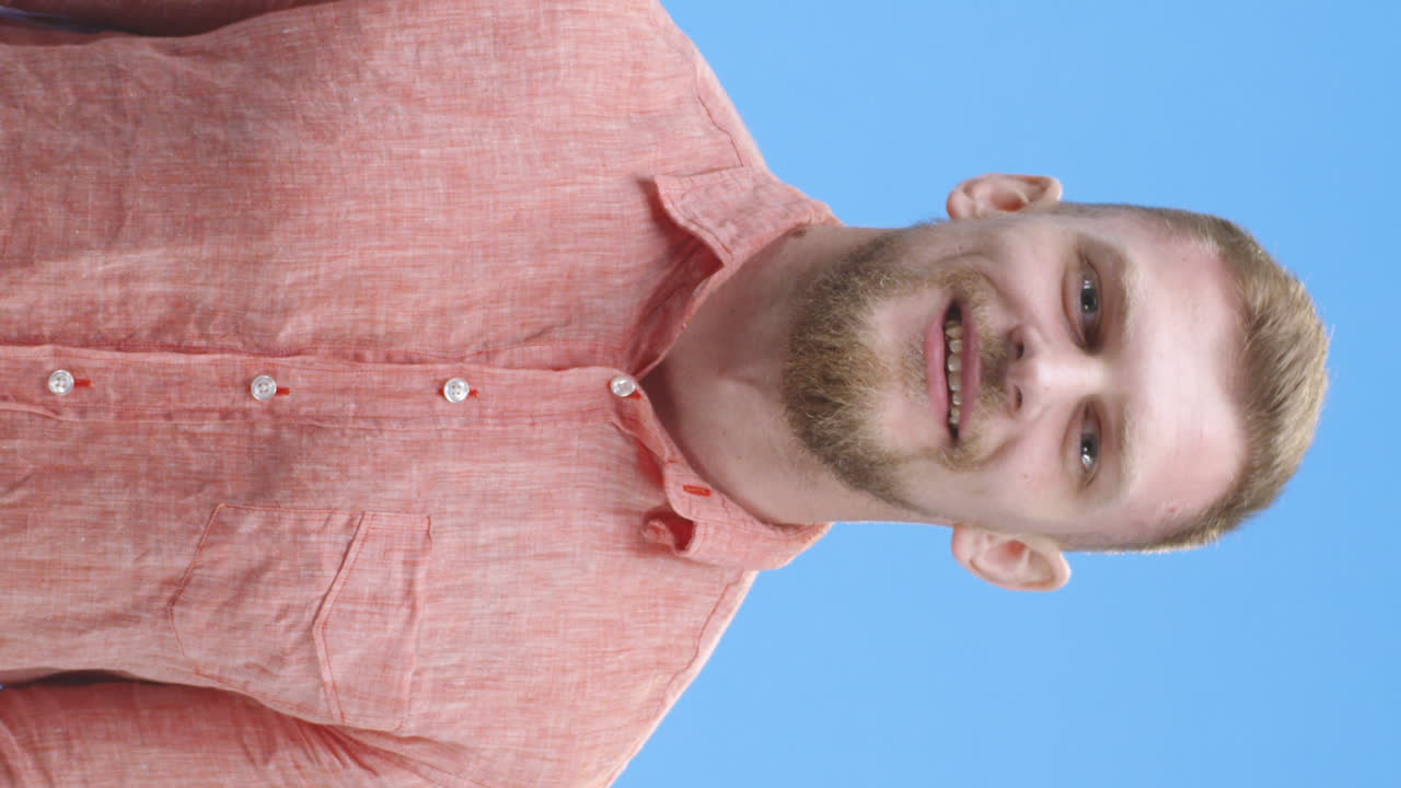 Man wearing a pink shirt