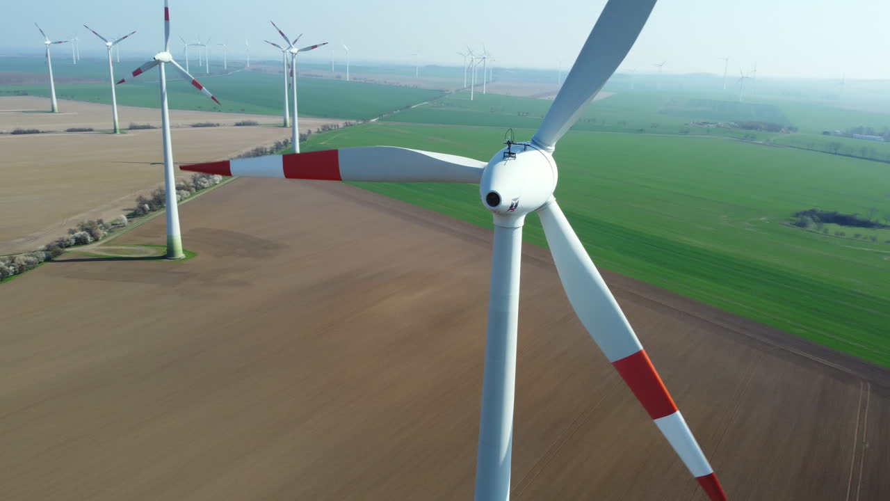 Aerial View of Wind Turbines in a Farmland