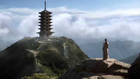 pagoda on a mountain with a woman looking out