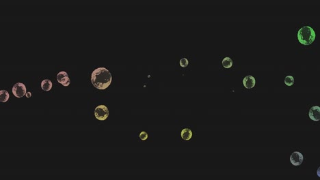 Animation-of-multiple-green-and-yellow-bubbles-floating-across-black-background