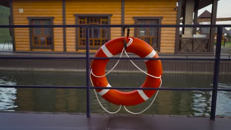 closeup view of orange lifeline on the ship