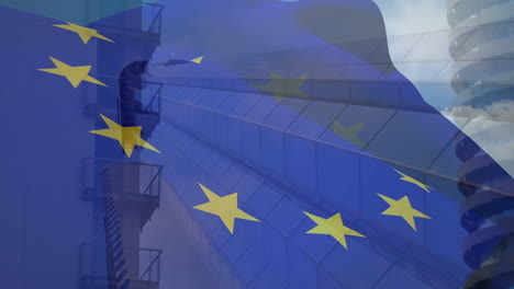 composite video of european union flag and uk flag waving against tall buildings