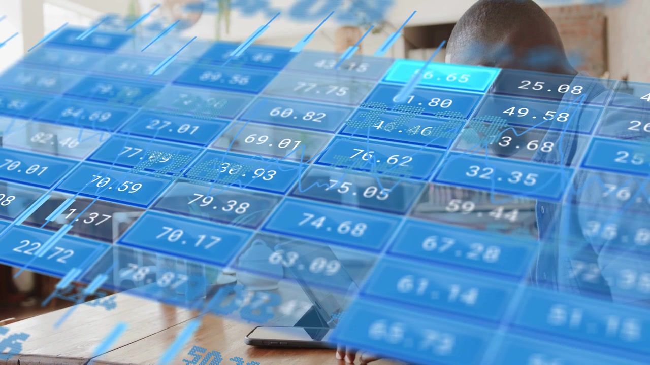 Man leaning over tablet at cafe reacting as floating blue tiles shifting and showing business data