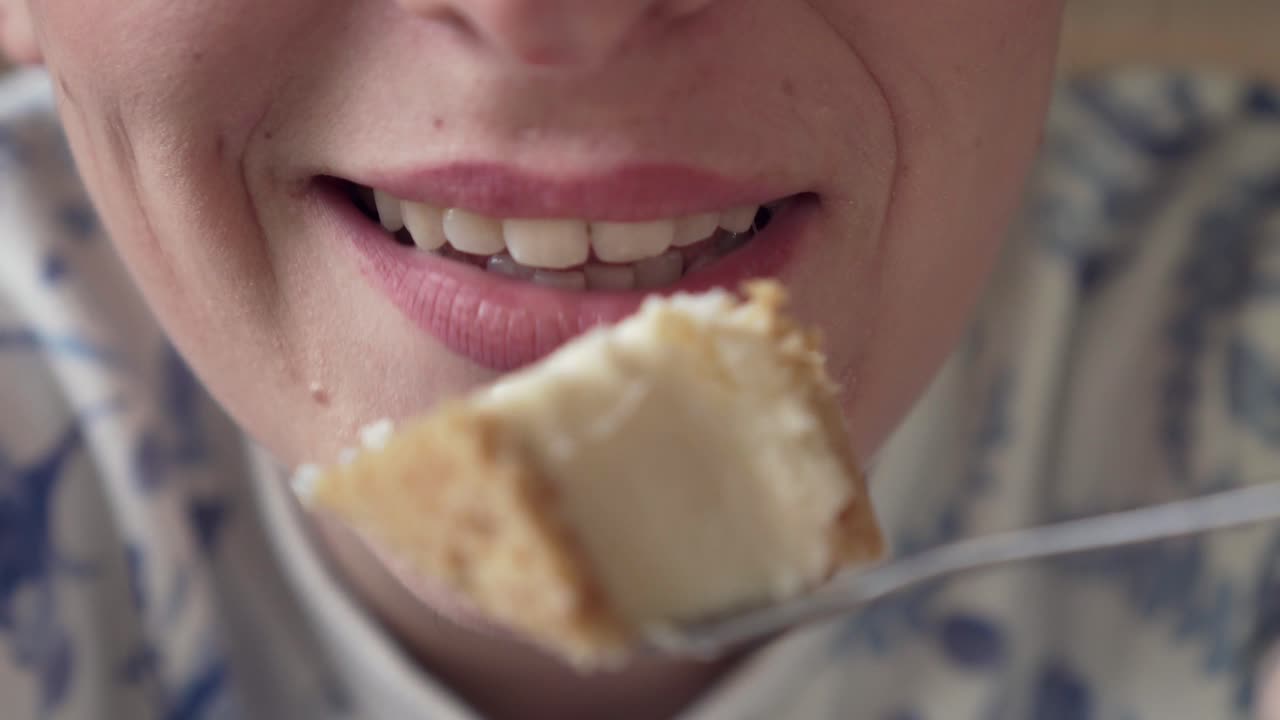 Eating tasty cake, closeup of mouth and lips