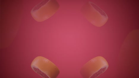 rebanadas de pomelo frescas lanzadas volando colgando en el aire y cayendo