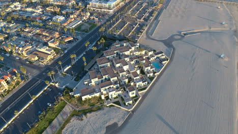 4k aerial flyover of beach front condos. a perfect travel destination.
