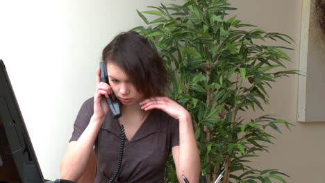 Irritate-woman-talking-on-phone